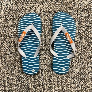 Cute blue and white striped pasea hotel and resort flip-flops
